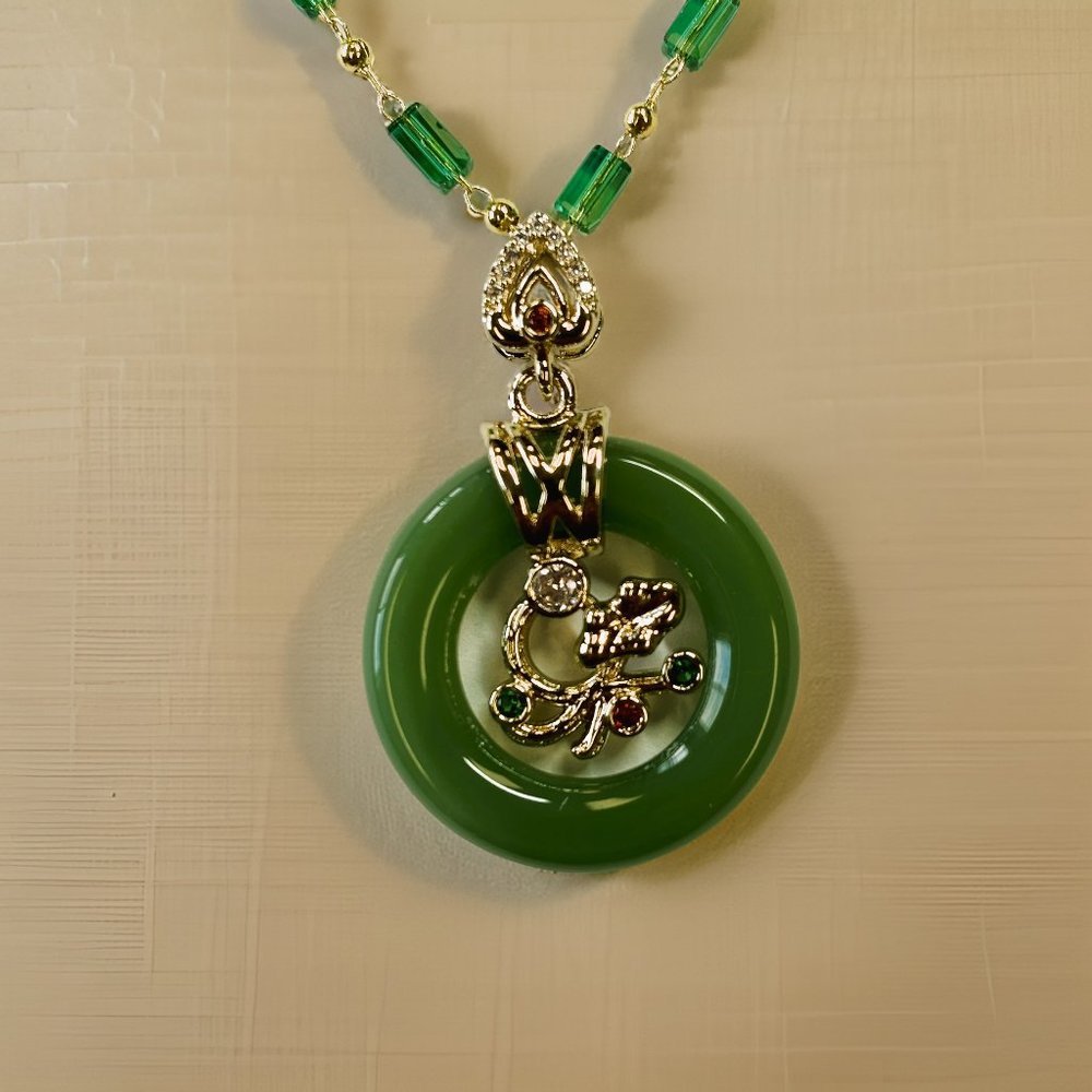 Gold and Jade Ring with Ruby Wealth Flower Pendant Necklace
